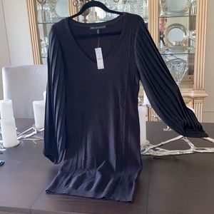 Black sweater dress mid length fluted sleeve